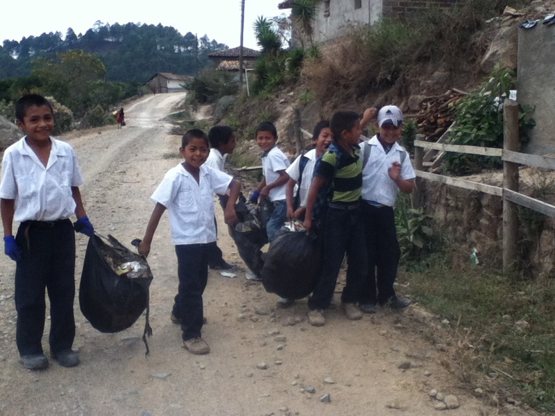 Children involved in cleaning their communities
