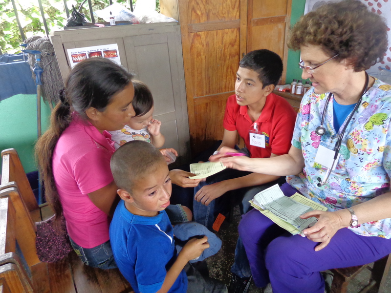 Pediatrician visiting children in the village of San Marcos de Caiquin 