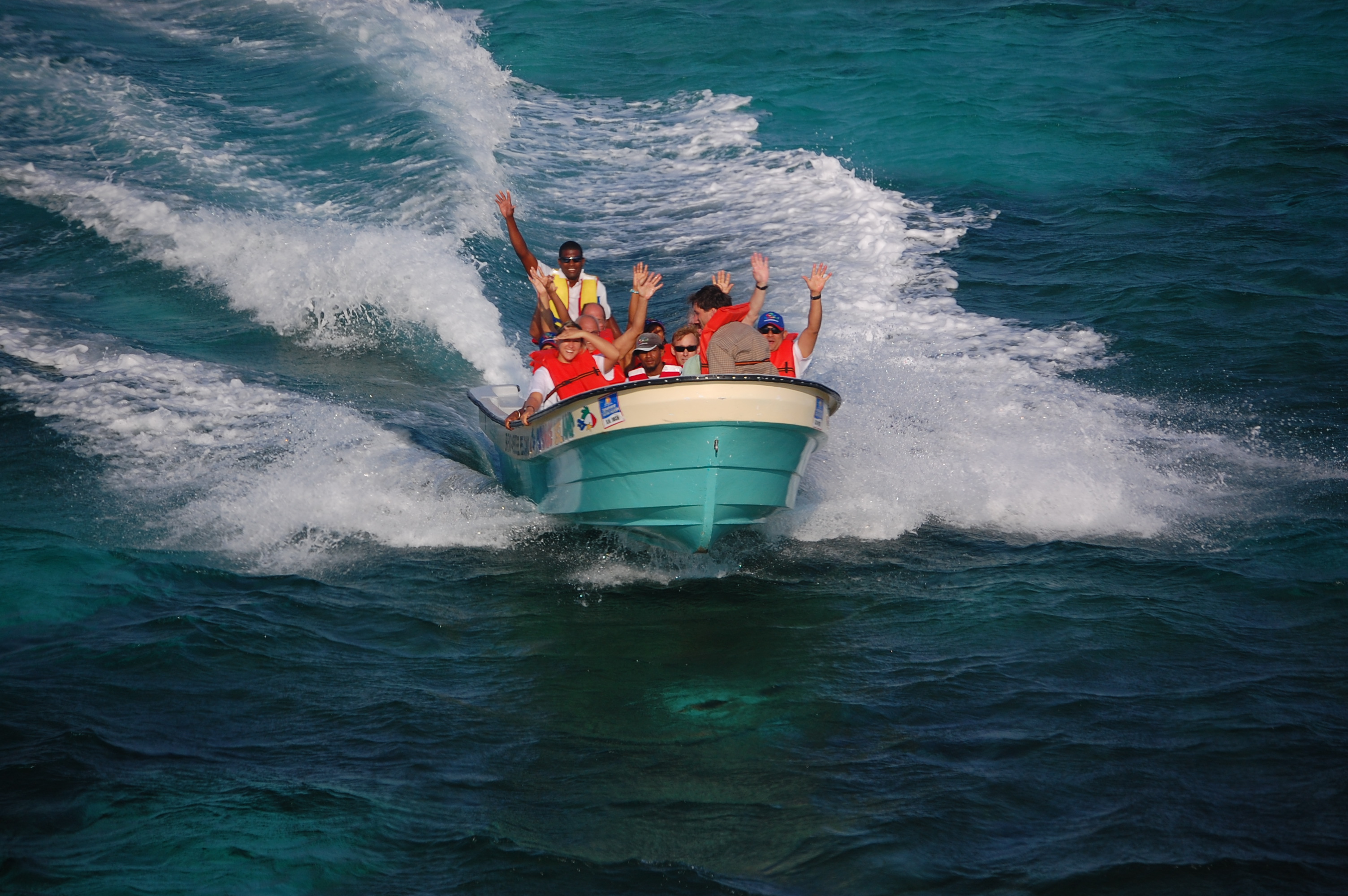 Revellers on a tour to Paradise Island by speedboat